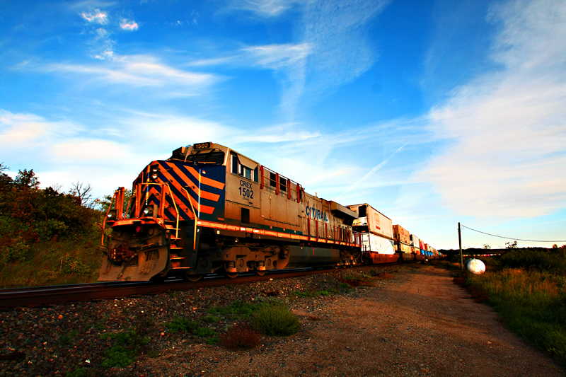 Train At Sunset by Ray